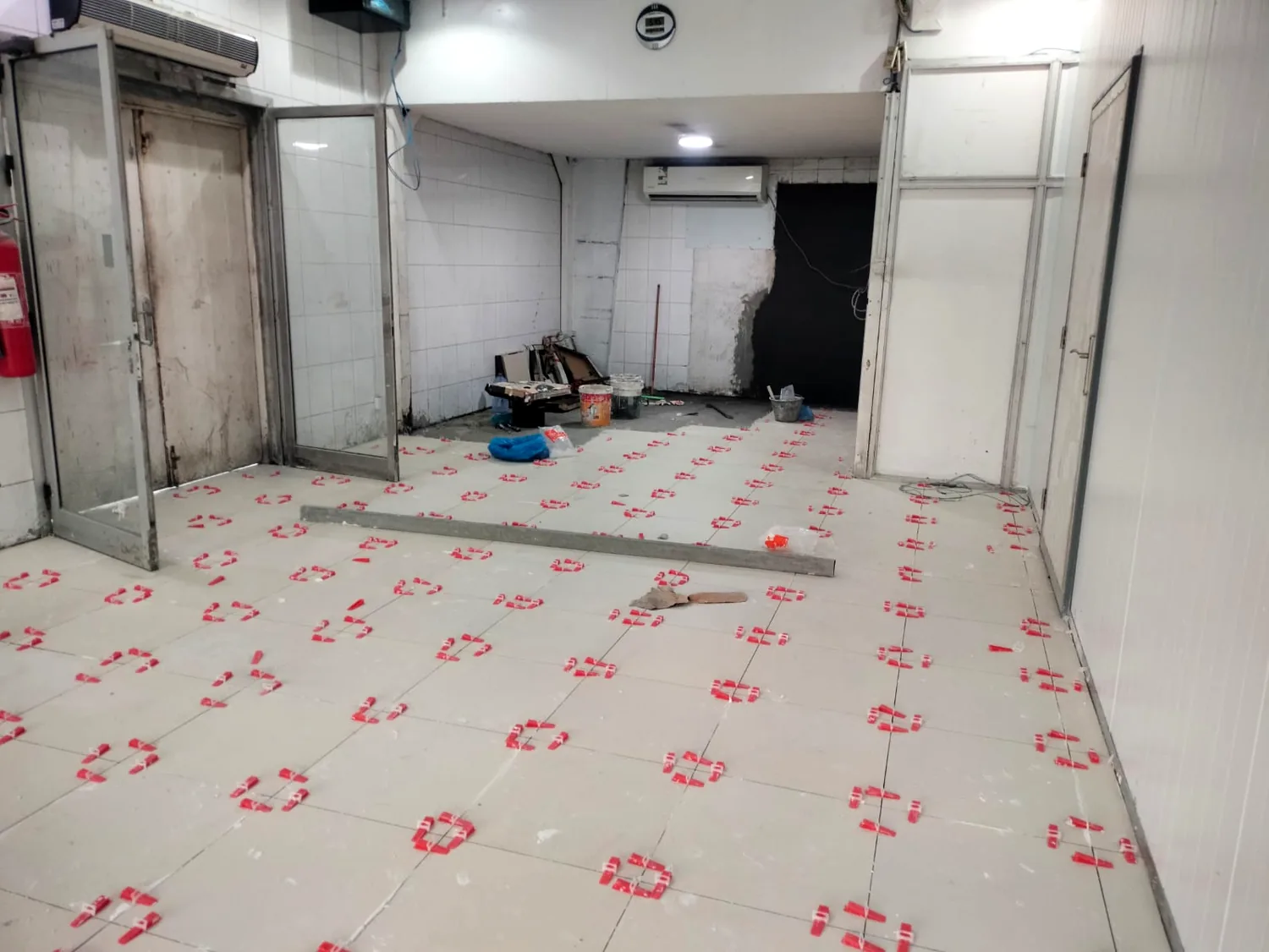Interior finishing and protective floor work at a project