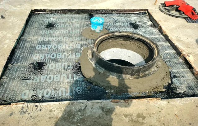 Protective waterproofing membrane on chamber cover